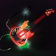 thumbnail image 2 of Guitarra Electrónica Milagrosa con Iluminación y Micrófono en Forma de Gafas, 2 of 6