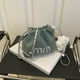 thumbnail image 1 of Bolso de mezclilla de nicho para mujer, nuevo y popular bolso bandolera con cadena que combina con todo, bolso tipo cubo con cordón, 2025, 1 of 5