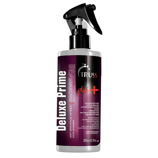 spray para el cabello truss deluxe prime plus, antirotura, 260 ml botella cilíndrica frontal con pulverizador negro y etiqueta morada y negra con logotipo TRUSS y texto 'Deluxe Prime' en blanco; tratamiento profesional en spray para cabello dañado y puntas abiertas, 260 ml; también suele usarse como tratamiento sin enjuague de corta duración para manejo y desenredo.