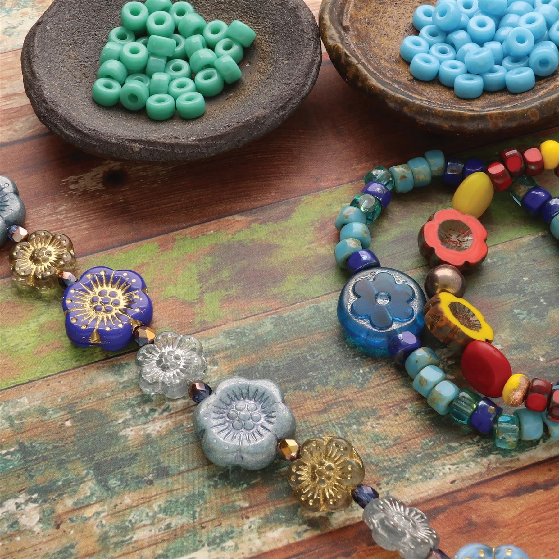 The Beadsmith Czech Glass Strands - High Quality, Pressed & Table Cut Beads – 6 x 7-Inch Strands, 19 Beads Per Strand – Blue New Gardens Mix – For Jewelry Making, Decorations & DIY Crafts
