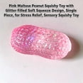 thumbnail image 3 of Pink Peanut Squishy Toy with Glitter Filled Soft Squeeze Design, Single Piece, for Relaxation, Sensory Squishy Toy, 3 of 4