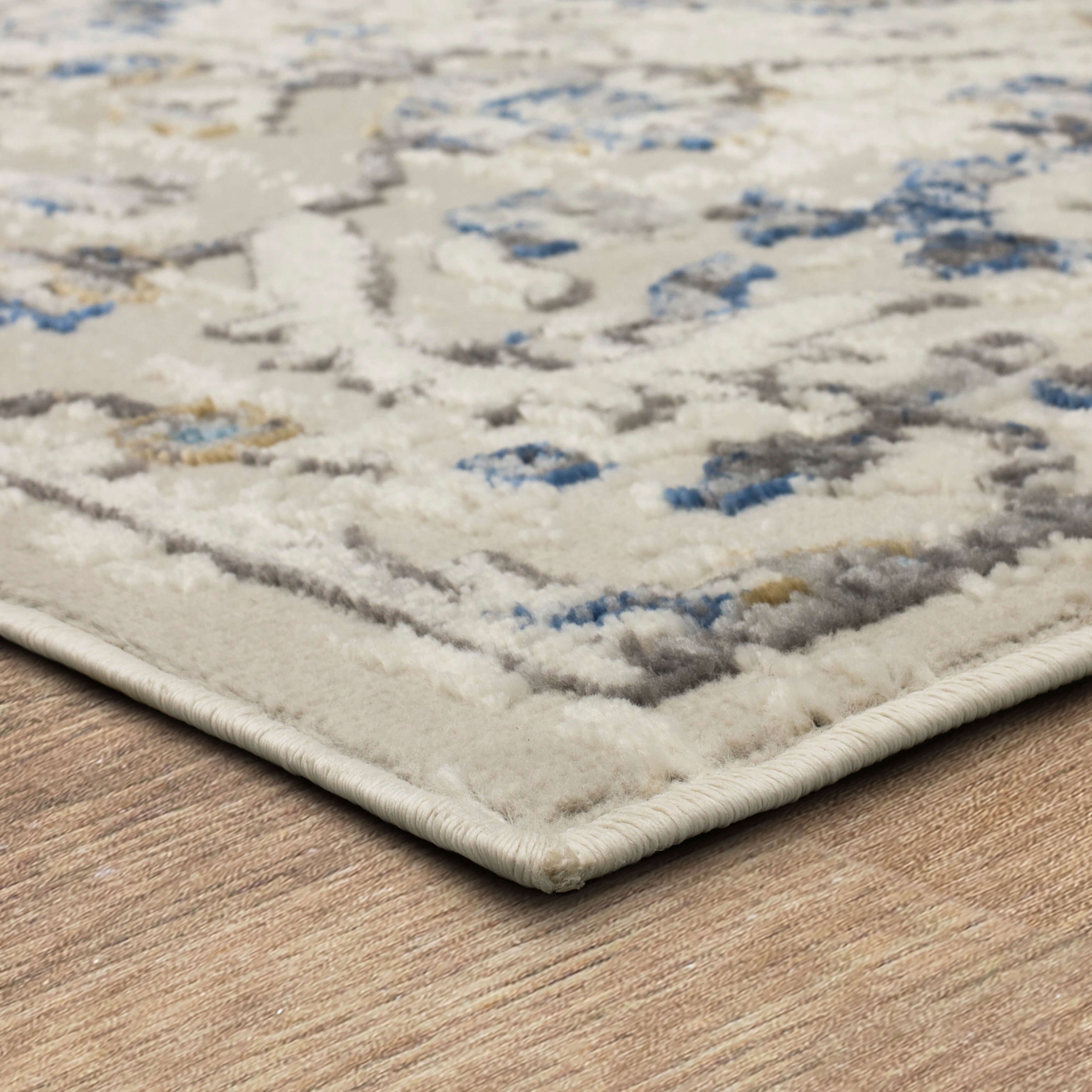 Mohawk Home Howlett Washable Low Pile Stain and Fade Resistant Indoor Area Rug, Blue, 7' 10" X 10'