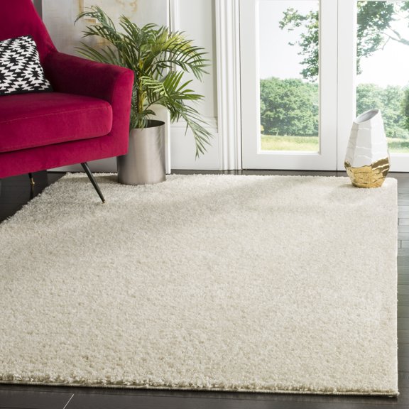 SAFAVIEH Arizona Cady Solid Shag Area Rug, Cream, 6'7" x 9'2"