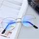 thumbnail image 1 of Gafas Redondas De Protección Contra Radiación Lentes Intercambiables De Mujer Hombres Moda Azul Luz Bloqueo Marco Metal Vintage Acero Cuero, 1 of 4