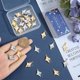 thumbnail image 3 of 1 caja de 32 dijes de luna y estrella dorados, dijes celestiales a granel, dijes de estrellas pequeñas de metal esmaltado plateado, bricolaje, 3 of 6