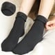 thumbnail image 5 of Calcetines de cama térmica para mujer Ropa de salón de invierno cálida Negro Sunnimix Calcetines de invierno para mujer, 5 of 7