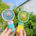 thumbnail image 2 of Kawaii Candy Color Verano Enfriador Ventilador Portátil De Mano Mini USB Recargable Silencioso De Aire Tamaño Bolsillo Escritorio Soporte Para Teléfono, 2 of 4