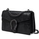 thumbnail image 1 of Bolso bandolera MYHOZEE con estampado de serpiente en piel negra, 1 of 7