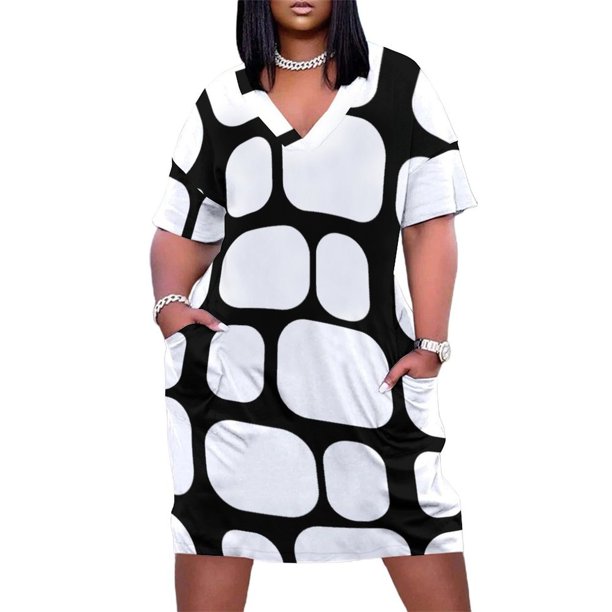 Vestido holgado con estampado de bloques inspirado en la moda de mediados de siglo y bolsillo corto largo y llamativo.