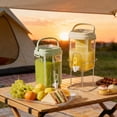 thumbnail image 1 of Plastic Cold Water Bottle 2000ml Refrigerator Water Pitcher with Tap Large Capacity Beverage Container 1-Set（3Pcs）with Iron Rack and Tea Tray Beige by JASKFLY, 1 of 7