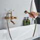 thumbnail image 2 of Mezclador de baño retro con doble manija Mezclador de baño retro Grifo de ducha de latón Grifo de bañera con ducha de mano de latón MAGIC, 2 of 5