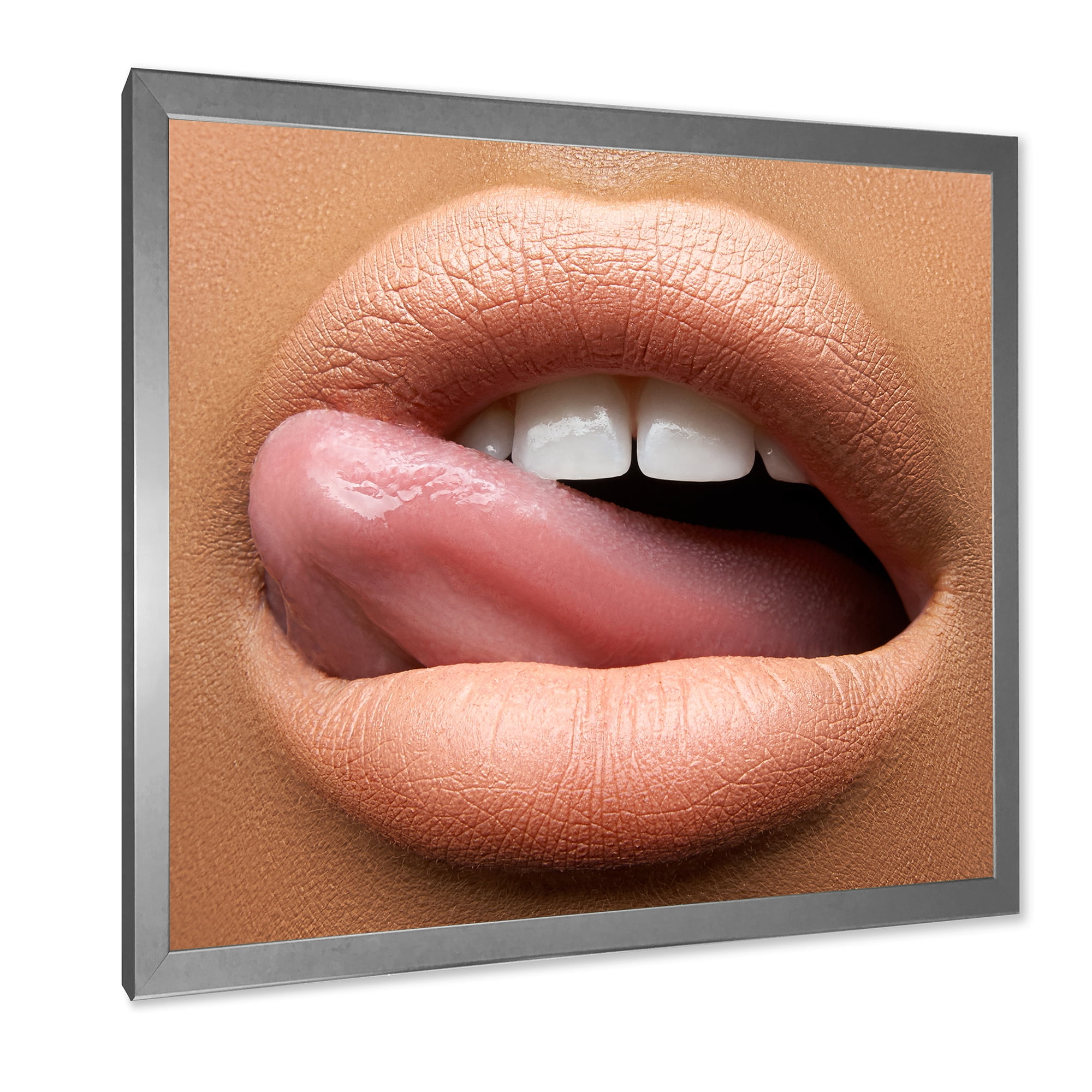 Designart 'Beautiful Dark Skinned Female Tongue Touching Lips' Modern Framed Art Print