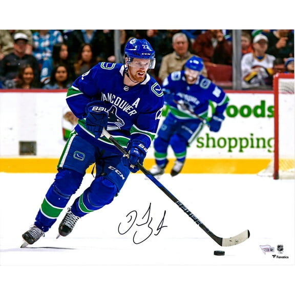 Daniel Sedin Vancouver Canucks Autographed 16" x 20" Blue Jersey Skating Photograph - Fanatics Authentic Certified