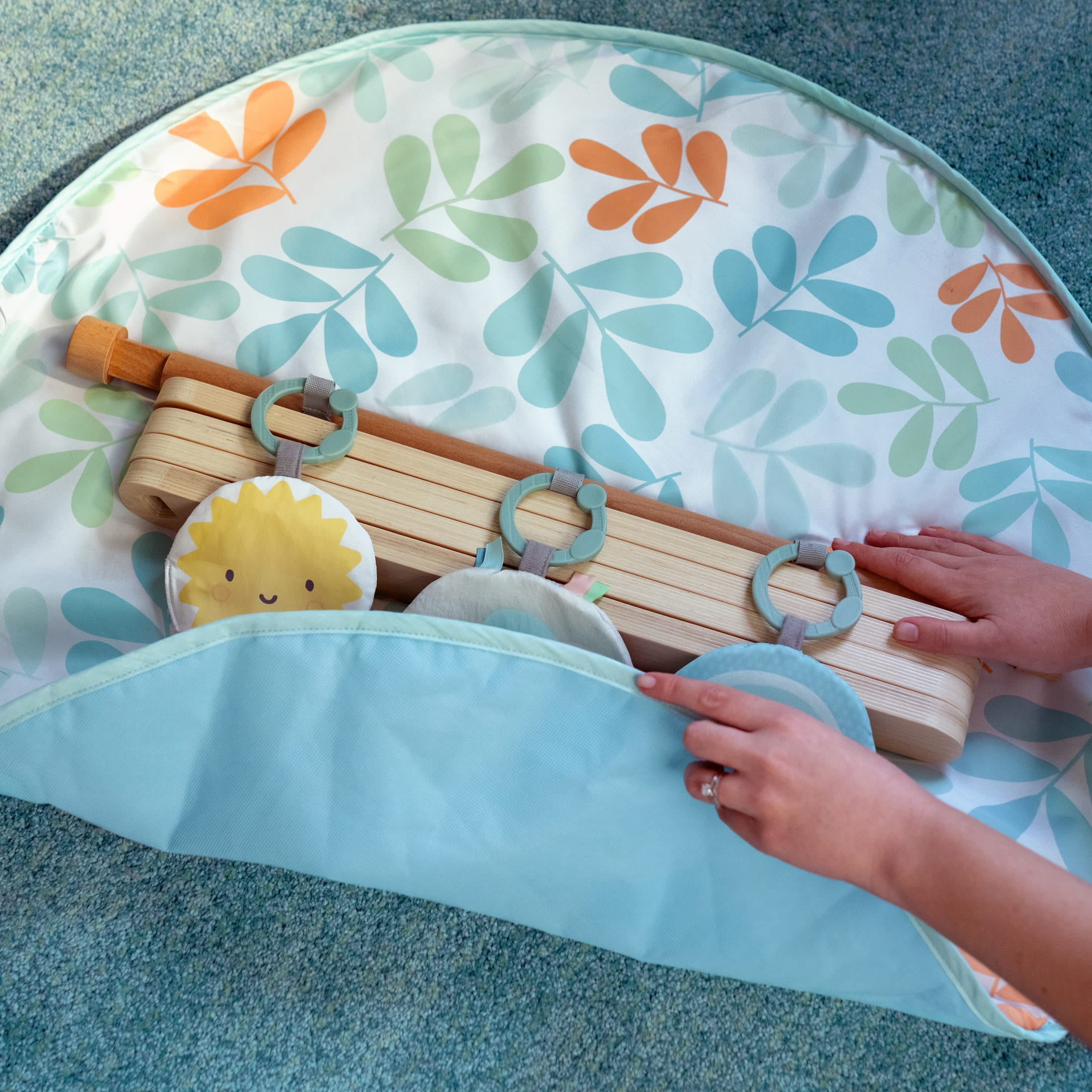 ity by Ingenuity Sun Valley Wooden Toy Arch & Play Mat, For Ages 0-36 Months