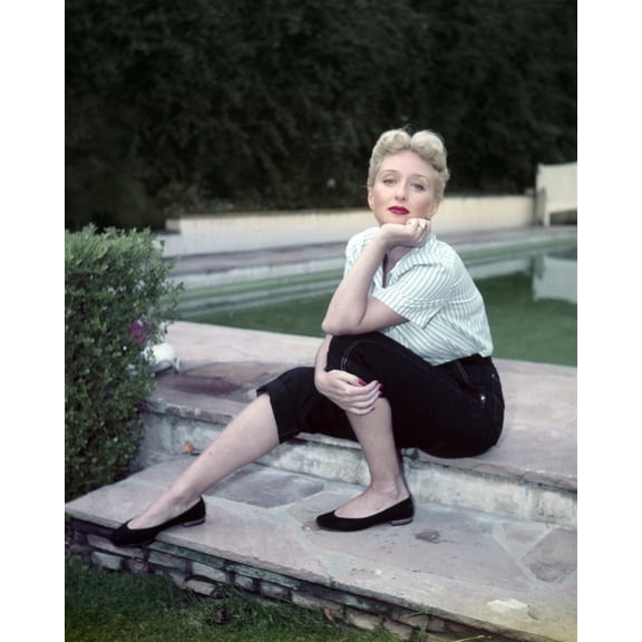 Celeste Holm 1940's poses at her home on steps by pool 24x30 inch poster