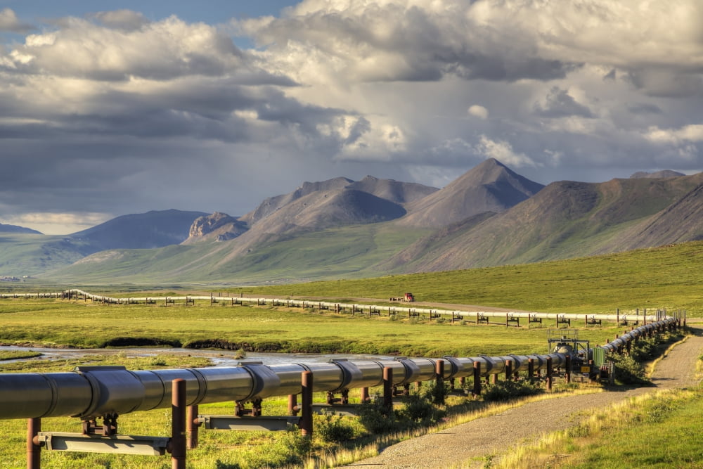 Semi truck driving the Haul Road (James Dalton Highway) along the Trans Alaska Oil Pipeline on the North Side of Atigun Pass in the Brooks Range Arctic Alaska Summer Canvas Art - Lucas Payne Design P