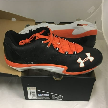 orange and black under armour cleats