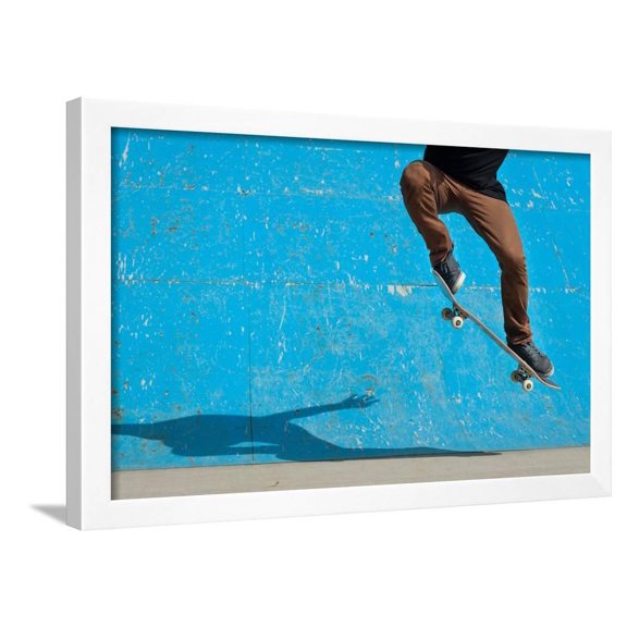 Skateboarder Doing a Skateboard Trick Ollie at Skate Park, Framed Art Print Wall Art by pio3 Sold by Art.Com