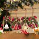 thumbnail image 1 of Adorno Navideño con Forma de Lazo, Piñas y Campanas para Árbol de Navidad., 1 of 7