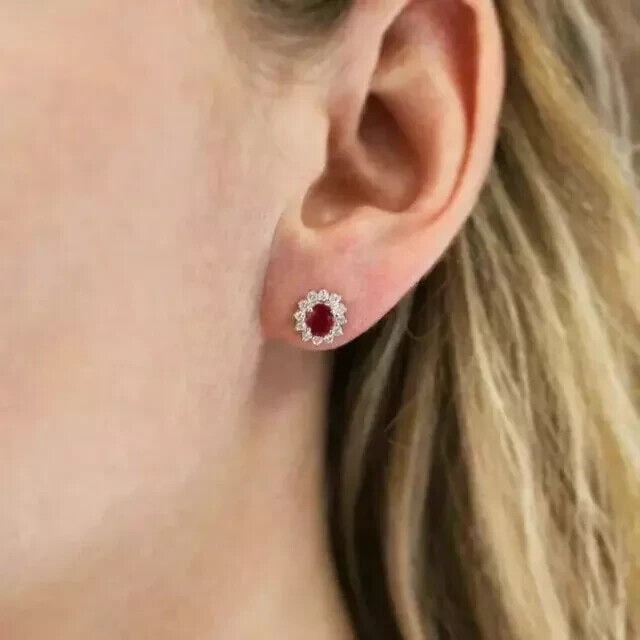 Divine Creation 1.35 Ct Oval Cut Red Ruby Halo Push Back Womens Stud Earrings 14K White Gold Plated 925 Sterling Silver