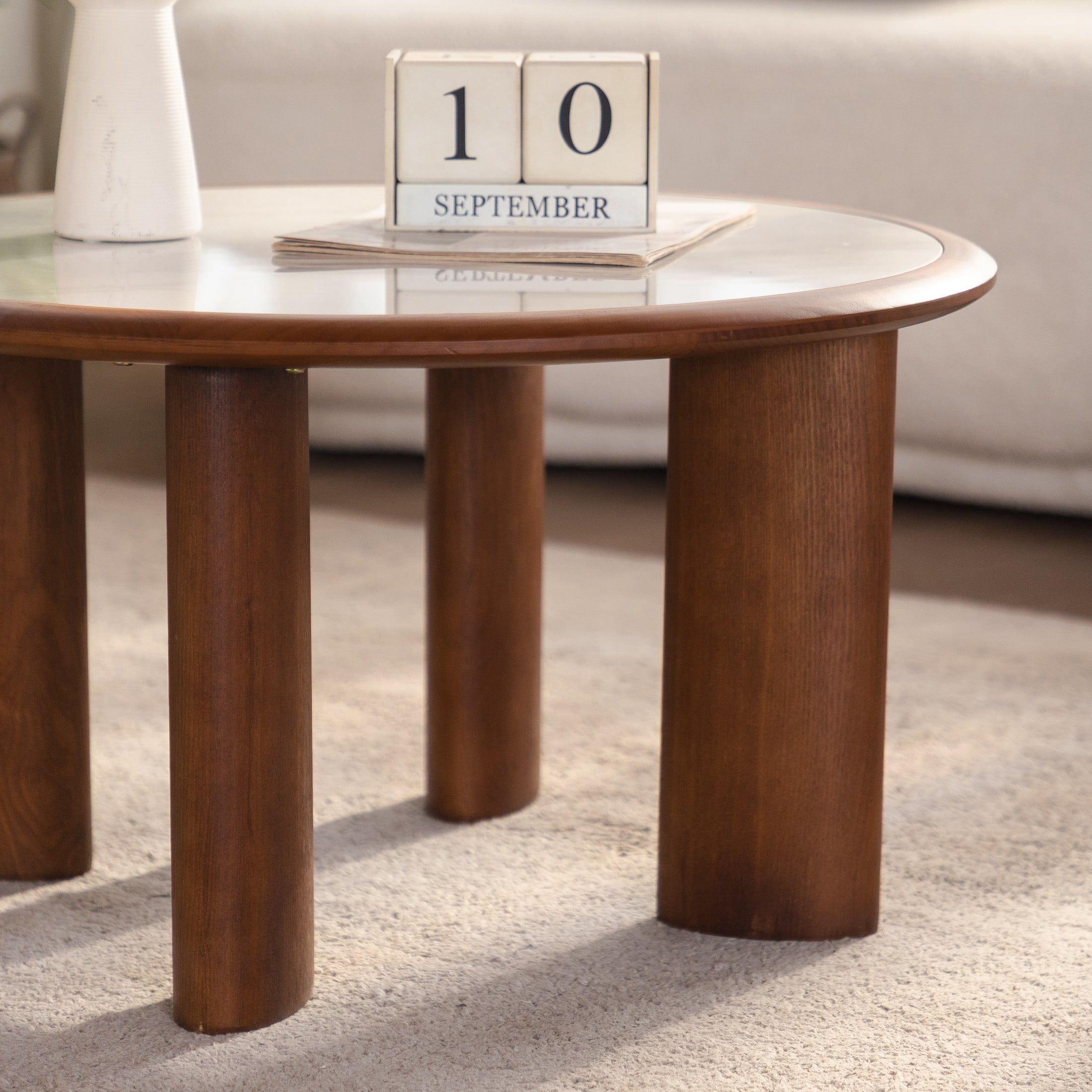 Noble House Ordis 27.76" Round Sintered Stone Coffee Table with Wood Veneer Frame & Cylindrical Legs, White & Walnut
