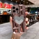 thumbnail image 1 of Funda De Lujo Con Forma De Corazón 6D Para iPhone 11 13 12 14 Pro MAX 14 Plus 13 14 promax Brillante De Silicona Suave A Prueba De Golpes, 1 of 4