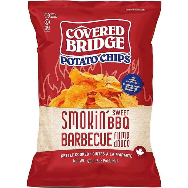 Covered Bridge - Smokin' Sweet BBQ, 170g kettle-cooked potato chips bag in red and beige with flame graphics, featuring dark russet potatoes, gluten-free and made in Canada, ideal for snacking or pairing with dips.
