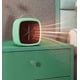 thumbnail image 1 of Green portable mini winter heater, suitable for bedroom, office and living room, energy-saving and quiet, 1 of 5