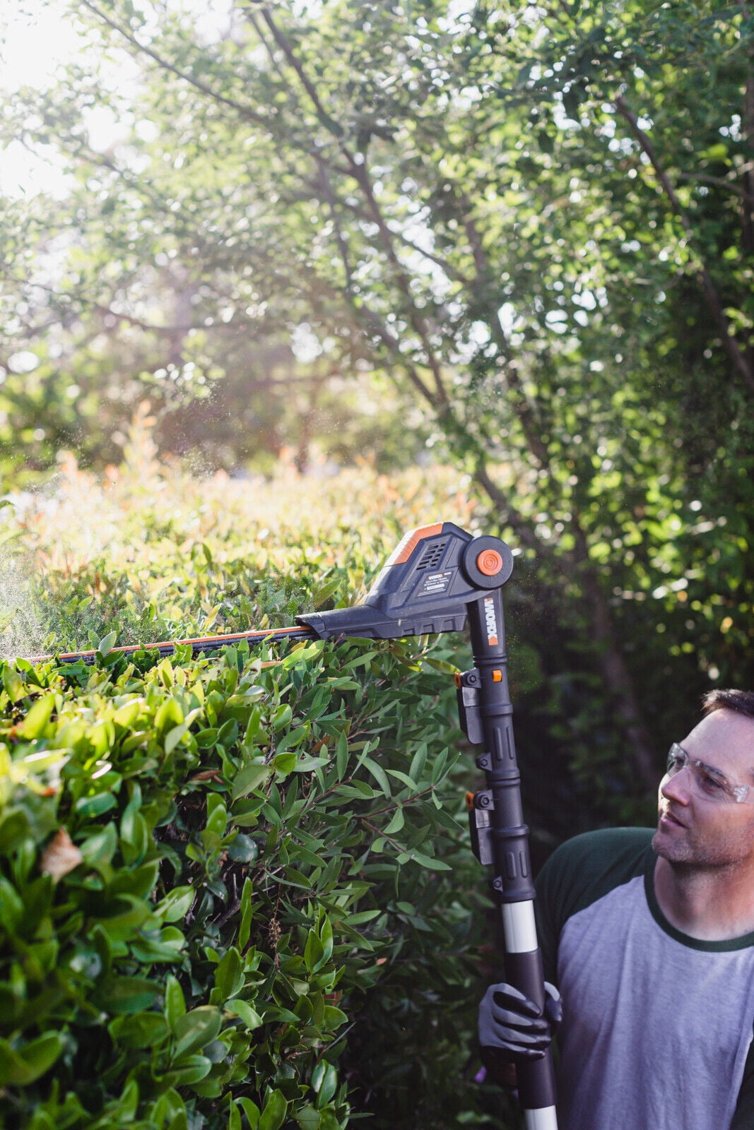 Restored Worx WG252 20" - 20V Pole Hedge Trimmer with 13' Reach, 10-Position Head, Rotating Handle (Refurbished)