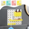 thumbnail image 1 of Estantes de almacenamiento montados en la pared | Diseño de tableros perforados | Material plástico | Multiusos para salón, cocina, dormitorio | Personalizable y sin perforación | Blanco, Amarillo, 1 of 5