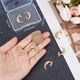 thumbnail image 3 of 1 caja de 10 colgantes de luna con estrella chapados en oro de 16 quilates con anilla para hacer joyas, collares y pulseras., 3 of 5