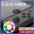 thumbnail image 2 of 1/2/4/10 Pcs Capuchon Analogique 3D pour Nintendo Switch et Switch Lite Pièces de Réparation Plusieurs Couleurs Remplacement Capuchons de Joystick pour Switch 03 4 Pcs, 2 of 6