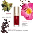 thumbnail image 4 of Aceite Lip Comfort Clarins que calma, hidrata y rellena los labios, 93% natural, 4 of 7