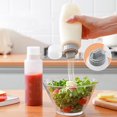 thumbnail image 1 of Botella de condimento para cocina doméstica, botella de salsas transparente a escala con tapa, botellas de condimentos de plástico transparente, dispensador para ketchup, aderezo para ensaladas,, 1 of 6