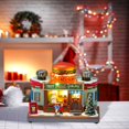 thumbnail image 1 of Estatua de casa de pueblo navideña, adorno navideño con iluminación LED, accesorio artesanal, regalo navideño giratorio superior para centro de mesa. Forma de hamburguesa, 1 of 8