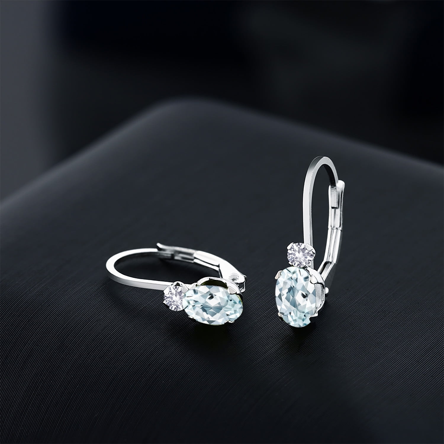 Gem Stone King 925 Sterling Silver Sky Blue Aquamarine & White Created Sapphire Leverback Earrings for Women (1.08 Cttw, Gemstone Birthstone, Oval 6X4MM, Round 2MM, 3/4 inch)