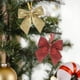 thumbnail image 1 of Adorno Navideño Dorado con Lazo para La Punta Del Árbol | Poliéster | 5 X 5 X 0,5 Cm | Lentejuelas Brillantes | 1 Unidad, 1 of 6