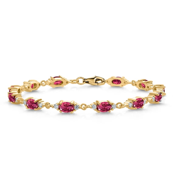 Gem Stone King 18K Yellow Gold Plated Silver Pink Tourmaline and White Moissanite Tennis Bracelet for Women (6.61 Cttw, Gemstone Birthstone, Oval 6X4MM, 7.5 inch)