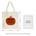 thumbnail image 3 of Stylish cream canvas tote bag featuring a large orange and brown pumpkin filled with Halloween words perfect for shopping and parties, 3 of 4