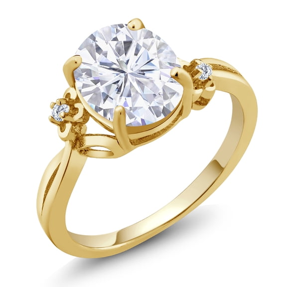 Gem Stone King 18K Yellow Gold Plated Silver White Moissanite and White Lab Grown Diamond 3 Stone Ring for Women (3.03 Cttw, Oval 10X8MM, Gemstone Birthstone, Size 6)