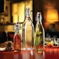 thumbnail image 6 of Bormioli Rocco 33.75oz Swing Bottle (Set of 2) - Reusable Glass with Airtight Leakproof Swing Tops, BPA-Free Office Water Bottle, Great for Homemade Syrups, Dressings, Infused Oils, Fresh Juices, 6 of 7