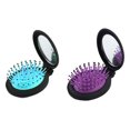 thumbnail image 1 of Juego de 2 cepillos de viaje TUNC mini con espejo plegable fucsia azul, 1 of 5
