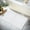 Bright White, variant on Premium Cotton Banded White Bath Mats Pack of 2, 22x34 inches [Not a Bathroom Rug] - Infinitee Xclusives