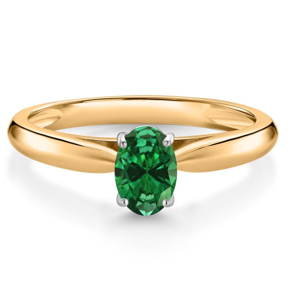 Gem Stone King 0.35 Ct Oval Green Created Emerald 10K Yellow and White Gold Solitaire Engagement Ring (Size 7)