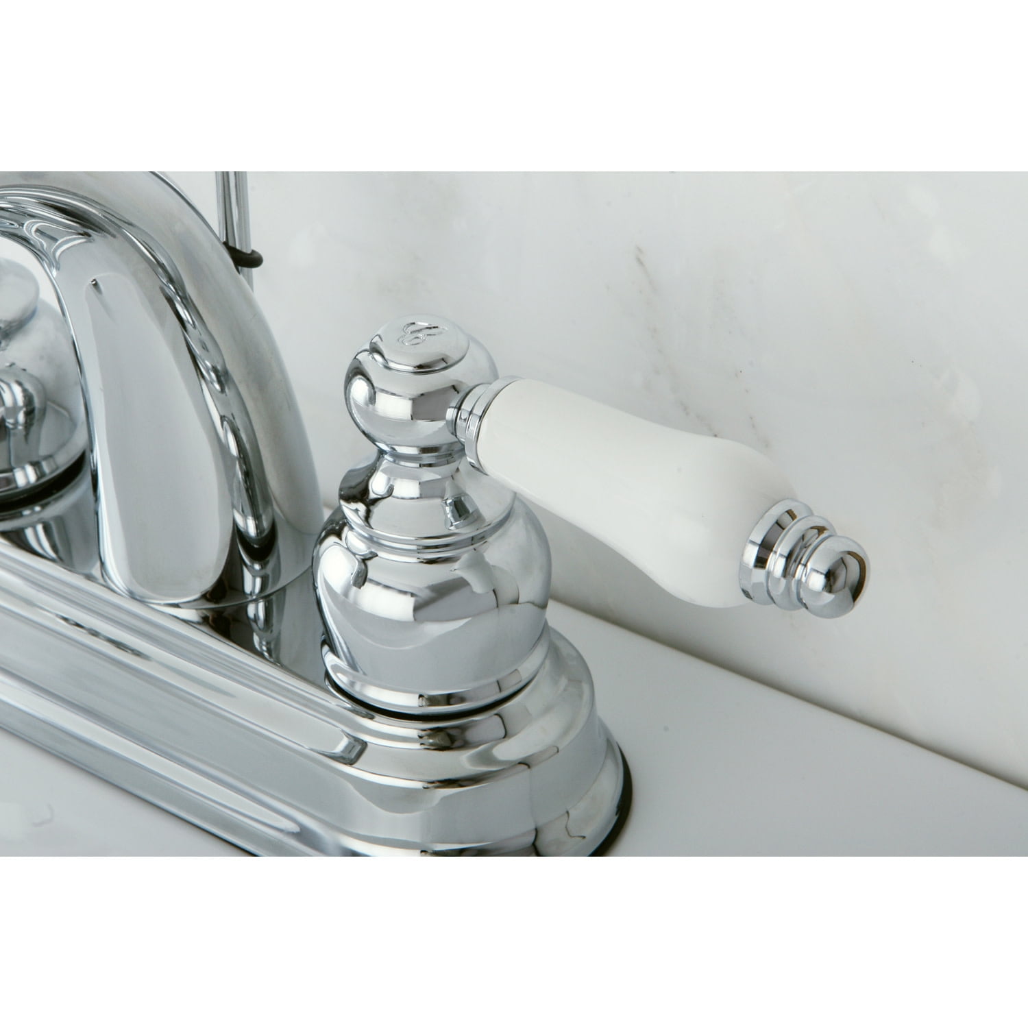 Kingston Brass Restoration Two Handle 4" Centerset Lavatory Faucet with Retail Pop-up
