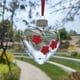 thumbnail image 5 of Comedero Colgante para Colibríes En Forma de Corazón con 3 Botellas de Flores | Dispensador de Agua y Semillas para Jardín Al Aire Libre (Paquete de 2) para Amantes de Las Aves, 5 of 6
