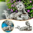 thumbnail image 4 of Solar Resin Boy Garden Statue - Handmade, Weatherproof, for Outdoor Gardens, Patio & Memorial Decoration, 4 of 8