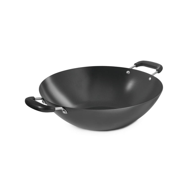 Walmart has these cast iron woks for $50 - anyone able to shed