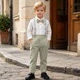 thumbnail image 4 of QTBIUQ Toddler Boys Three-Piece Suit Set Cotton Turn-Down Collar Shirt and Suspender Pants Formal Outfit Set with Bow Tie, 4 of 9