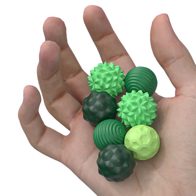 sensoriales bolas estrés magnéticos para adultos y adolescentes con autismo adhd ansiedad, set de ocho bolas magnéticas verdes de silicona de 22 mm aprox. en mano, con texturas acanaladas, facetadas y con protuberancias para estimulación táctil y agarre; a menudo usadas como herramienta sensorial portátil para concentración.